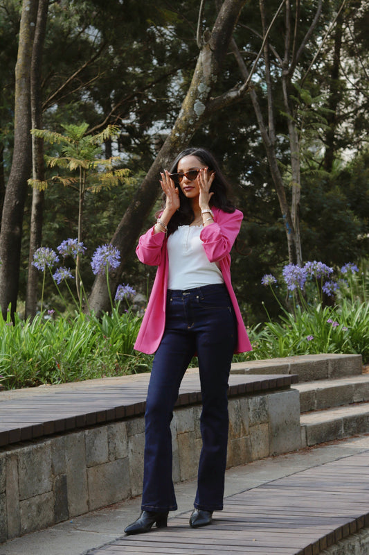 Women wearing ENKU Jeans with pink blazer 